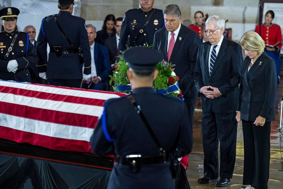 PHOTO: Sen. Joe Manchin, Senate Minority Leader Mitch McConnell , and Sen. Shelley Moore Capito pay respects to Hershel Woodrow  "Woody " Williams, in the U.S. Capitol Rotunda as his remains lie in honor on July 14, 2022 in Washington, D.C.