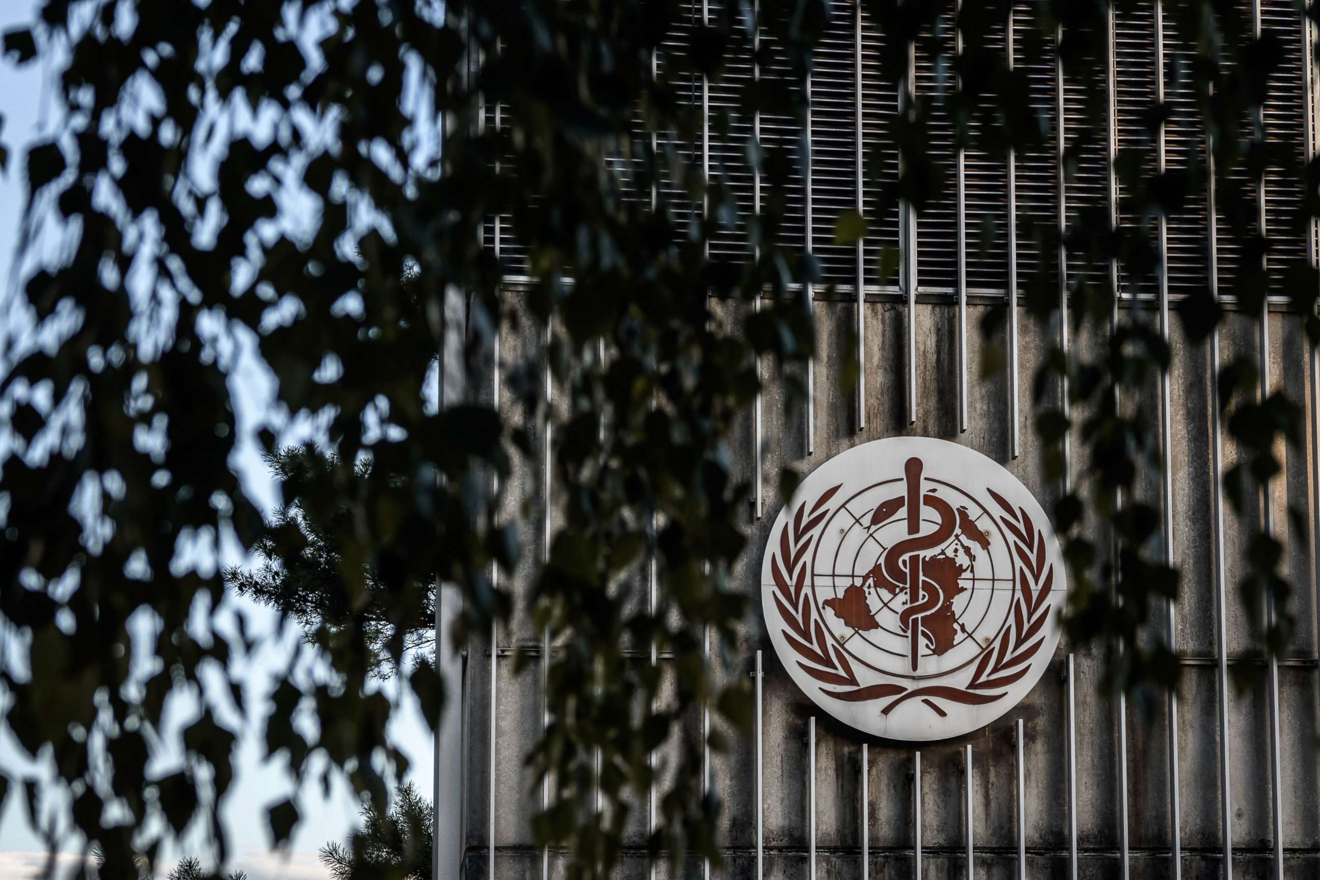 PHOTO: A photo taken in the late hours of Aug. 17, 2020, shows a sign of the World Health Organization at their headquarters in Geneva amid the COVID-19 outbreak.