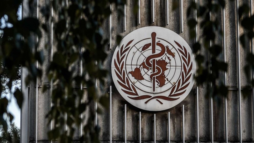 PHOTO: A photo taken in the late hours of Aug. 17, 2020, shows a sign of the World Health Organization at their headquarters in Geneva amid the COVID-19 outbreak.