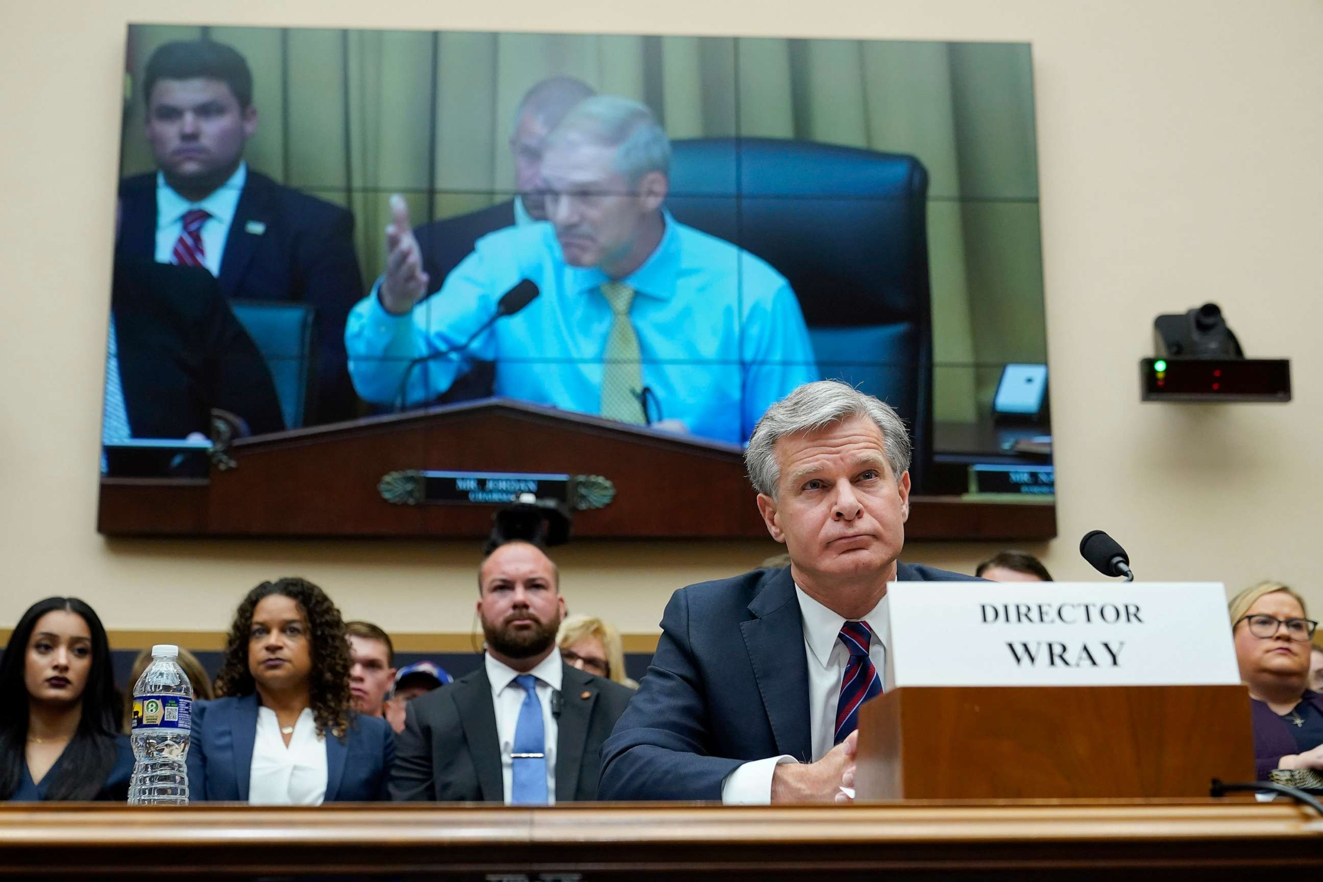 PHOTO: FBI Director Christopher Wray listens as Rep. Jim Jordan, chair of the House Committee on the Judiciary, speaks during an oversight hearing, July 12, 2023, on Capitol Hill in Washington, D.C.