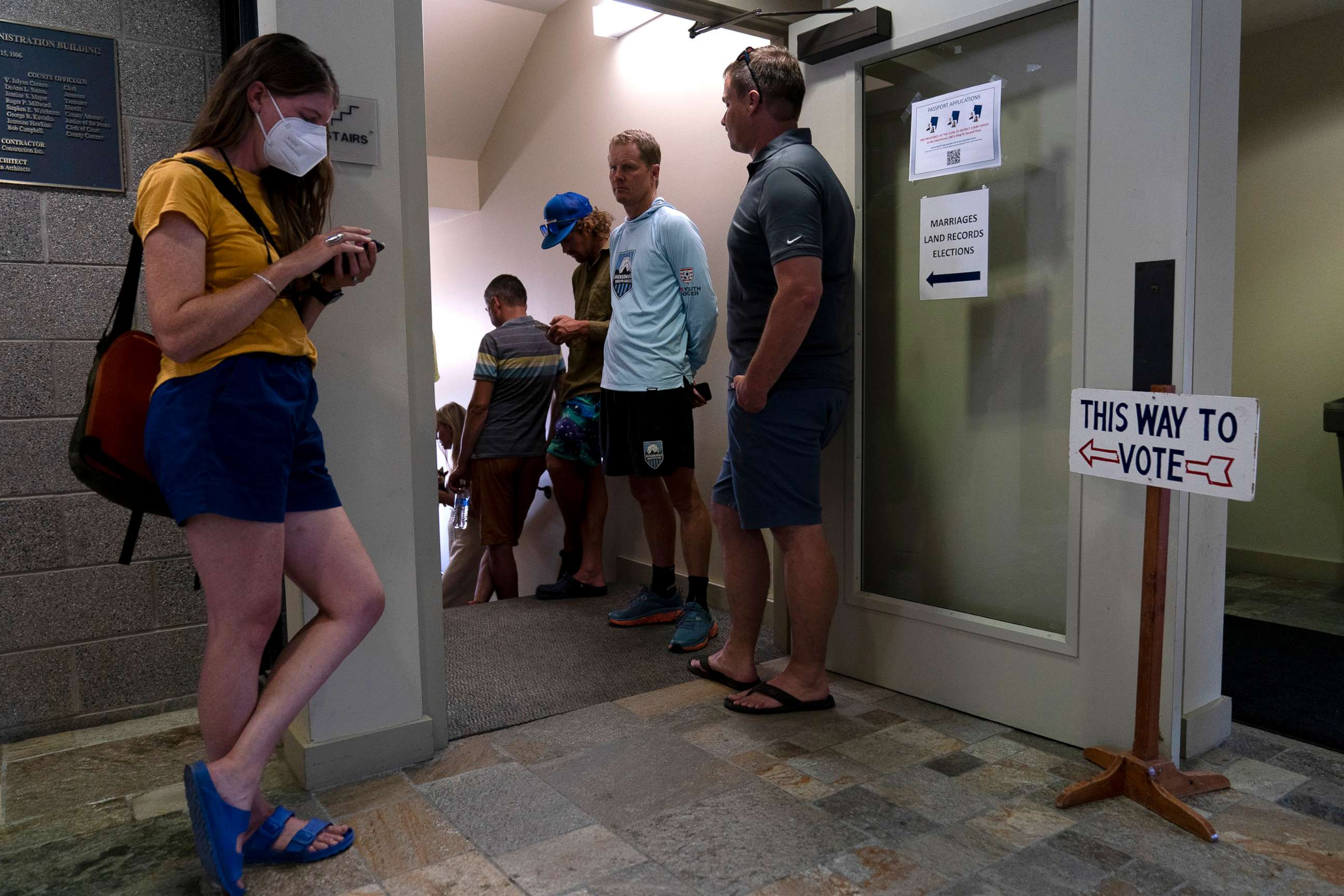 PHOTO: People wait in line to vote early ahead of Tuesday's Republican primary election in Jackson, Wyo., on Aug. 15, 2022.