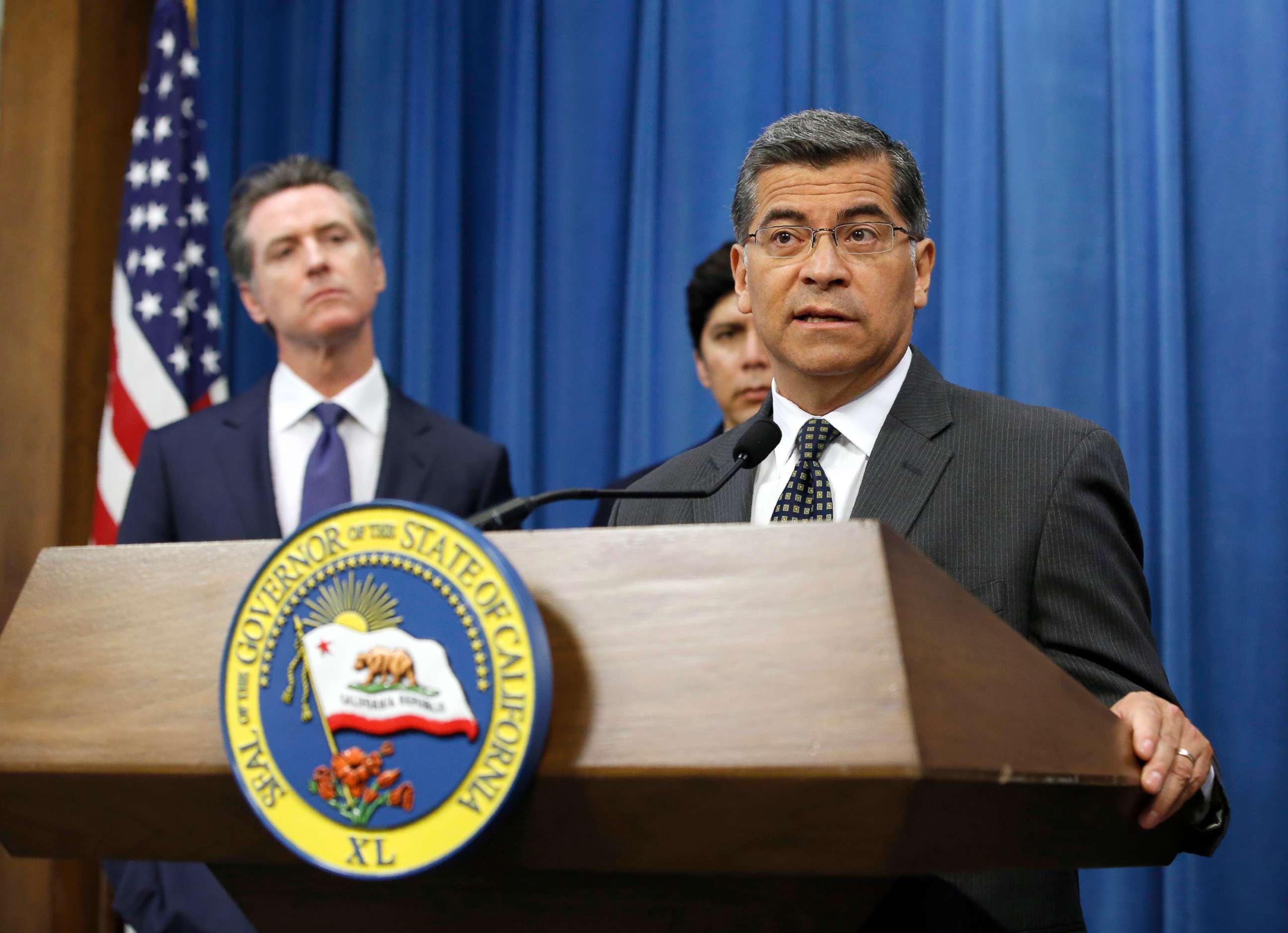 PHOTO: Attorney General Xavier Becerra speaks at the podium during a news conference in Sacramento, Calif., June 25, 2019.