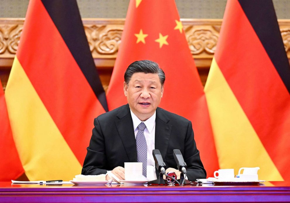 PHOTO: Chinese President Xi Jinping meets via video link with German Chancellor Olaf Scholz in Beijing, May 9, 2022. 