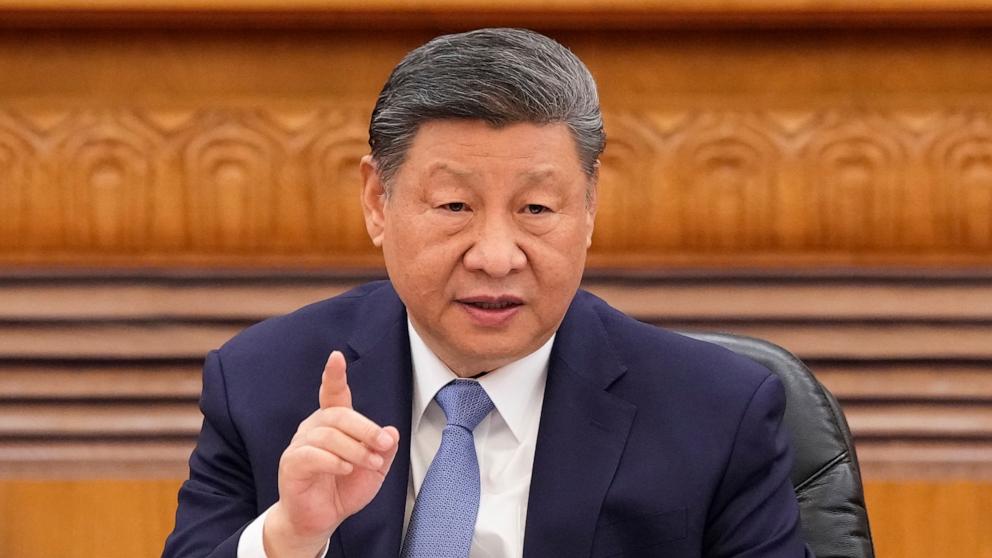 PHOTO: Chinese President Xi Jinping speaks during an international business meeting at The Great Hall Of The People on March 28, 2025 in Beijing, China.