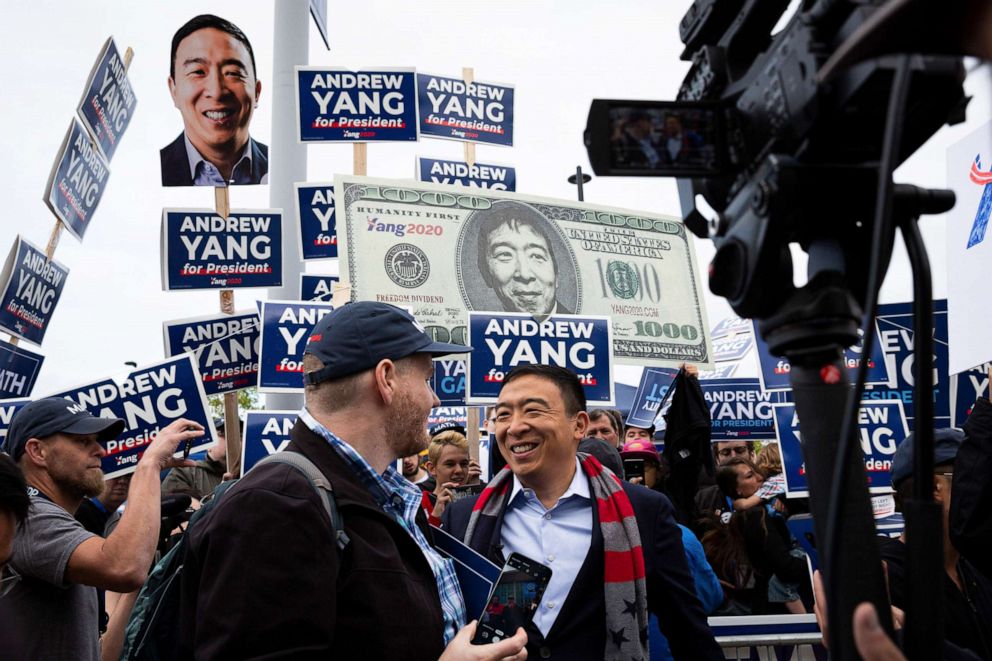 PHOTO: Andrew Yang with supporters outside the New Hampshire Democratic Party State Convention in Manchester, N.H., on Sept. 7, 2019.