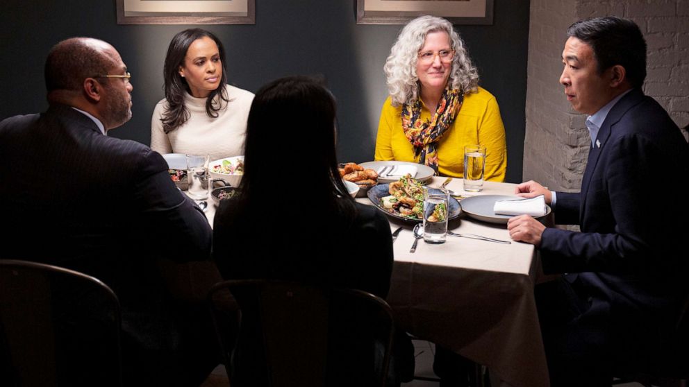 PHOTO: Democratic presidential candidate Andrew Yang, right, joins ABC's Linsey Davis, second from left and voters Ramsey Smith, Jaslin Kaur and Mara Novak for dinner in New York, Dec. 4, 2019.