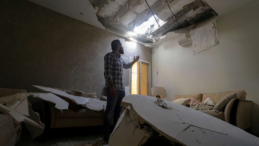 PHOTO: Mohamed Fahim inspects damage done to his home by an intercepted missile in the aftermath of what Saudi-led coalition said was a thwarted Houthi missile attack, in Riyadh, Saudi Arabia, Feb. 28, 2021.