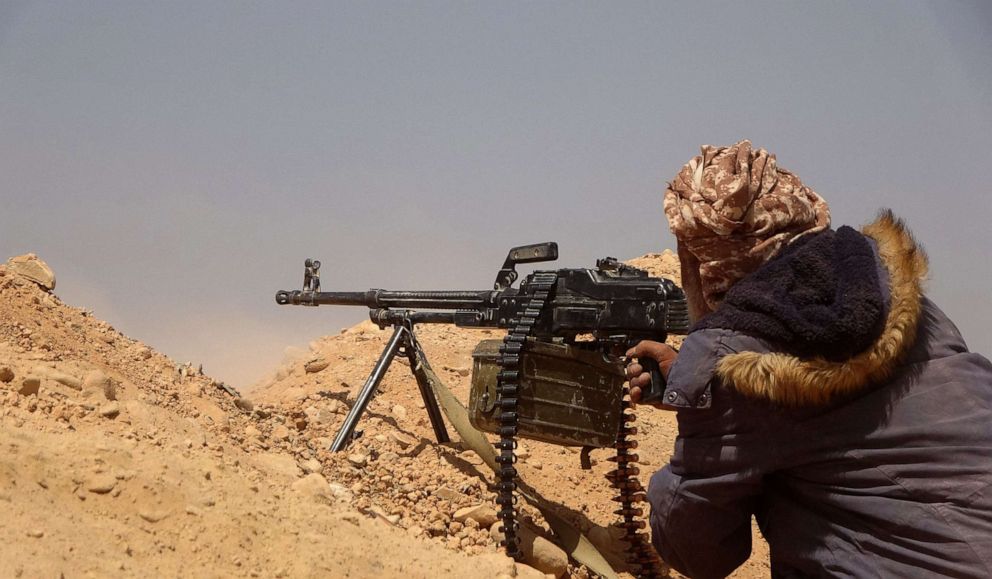 PHOTO: Forces loyal to Yemen's Saudi-backed government get into position during clashes with Houthi fighters in Yemen's northeastern province of Marib on March 4, 2021.