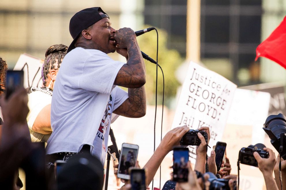 PHOTO: Rapper YG speaks during the YG x BLMLA x BLDPWR protest and march on June 07, 2020 in Los Angeles.