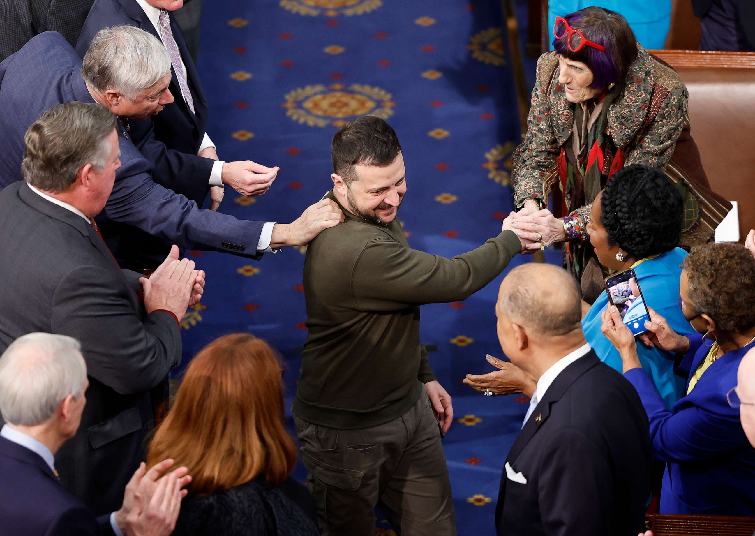 PHOTO: President of Ukraine Volodymyr Zelensky greets lawmakers as he arrives to addresses a joint meeting of Congress in the House Chamber of the U.S. Capitol on Dec. 21, 2022, in Washington, D.C.