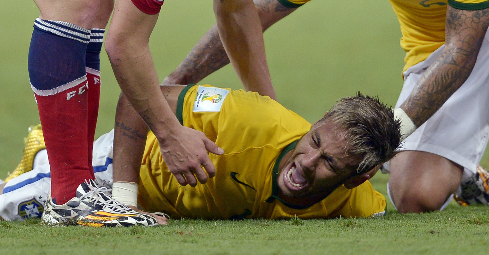 PHOTO: Brazil's Neymar screams out after being fouled during the World Cup quarterfinal soccer match between Brazil and Colombia at the Arena Castelao in Fortaleza, Brazil, July 4, 2014. 