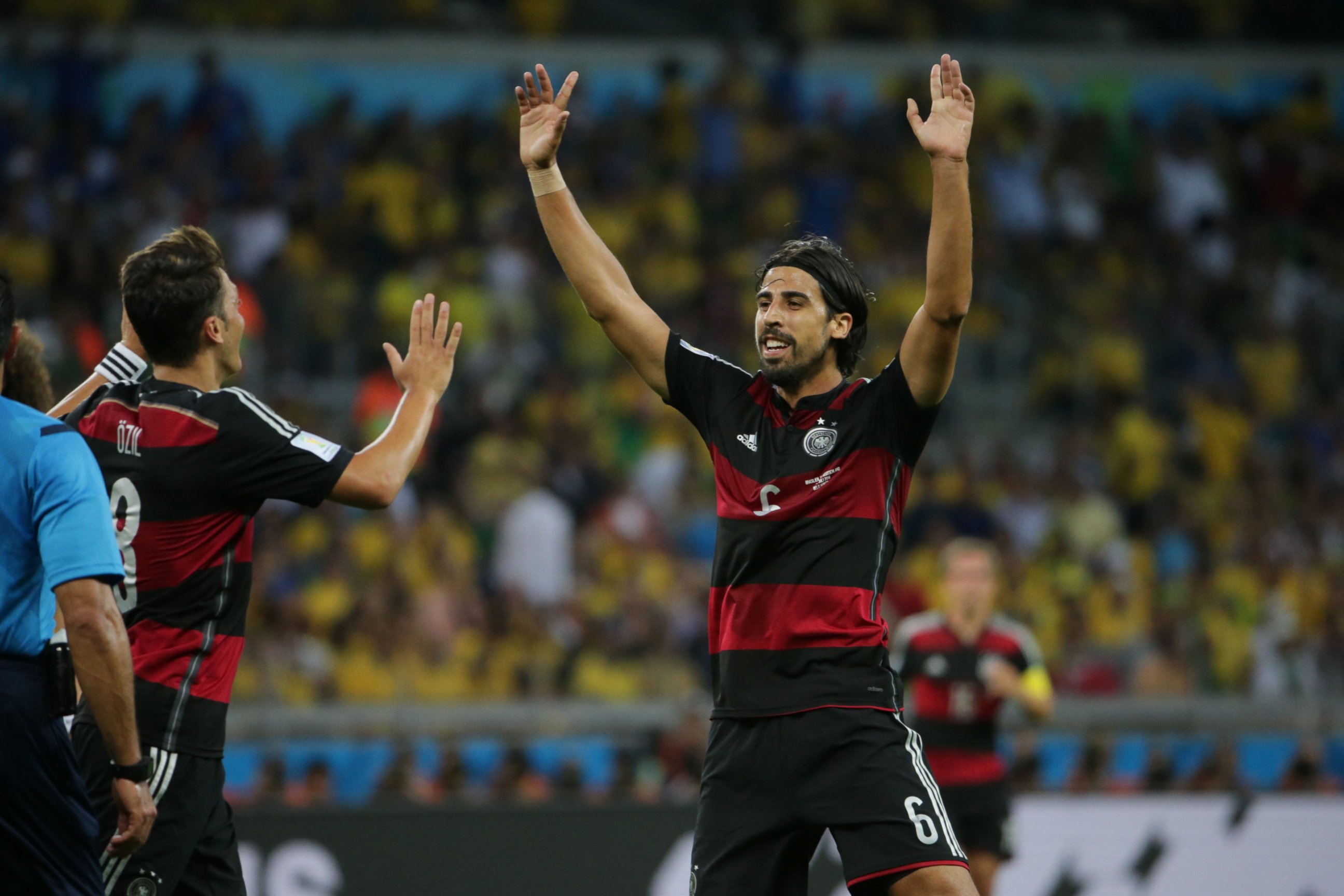 PHOTO: Germany's Sami Khedira, right, celebrates after scoring his goal during the World Cup semifinal soccer match between Brazil and Germany in Belo Horizonte, Brazil on July 8, 2014.