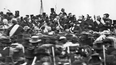 PHOTO: President Abraham Lincoln, center with no hat, surrounded by the crowd at Gettysburg