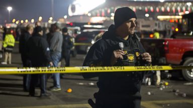 PHOTO: Kansas City, Mo. police officers and detectives examined a crime scene where one person died in Lot A of the Truman Sports Complex at Arrowhead Stadium in Kansas City, Mo., Dec. 1, 2013.