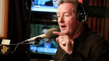 PHOTO: Piers Morgan visits The Opie & Anthony Show at SiriusXM Studios, Oct. 16, 2013 in New York.