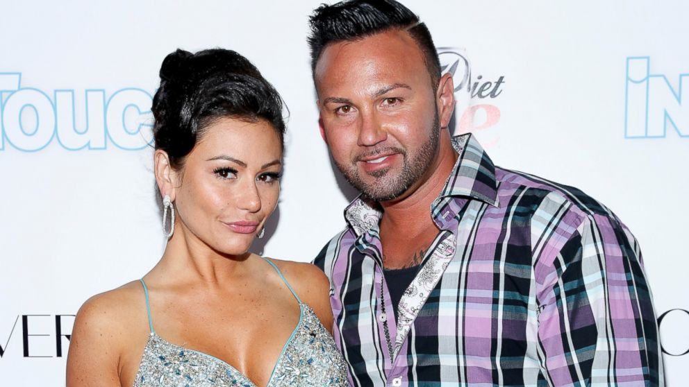 Jennifer "JWOWW" Farley and Roger Mathews arrive at Intouch Weekly's "ICONS & IDOLS Party," Aug. 25, 2013, in New York City.