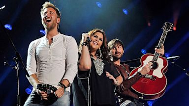 PHOTO: Charles Kelley, Hillary Scott, and Dave Haywood of the band Lady Antebellum perform at LP Field during the 2013 CMA Music Festival on June 7, 2013, in Nashville, Tenn.