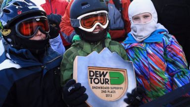 PHOTO: Snowboard fan Connor Tripp shows off the trophy that Shaun White gave him at the Dew Tour iON Mountain Championships in Breckenridge, Colorado, Dec. 14, 2013.