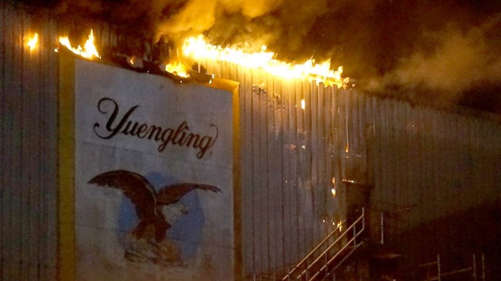 A fire burns at the Yuengling brewery in Tampa, Fla., Oct. 26, 2013.