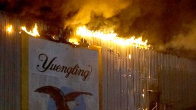 PHOTO: A fire burns at the Yuengling brewery in Tampa, Fla., Oct. 26, 2013.