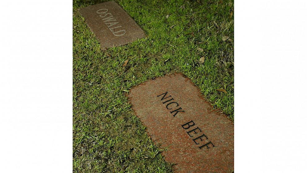 A gravestone with the name Nick Beef neighbors Lee Harvey Oswald's grave at Shannon Rose Hill Cemetery in Fort Worth. 
