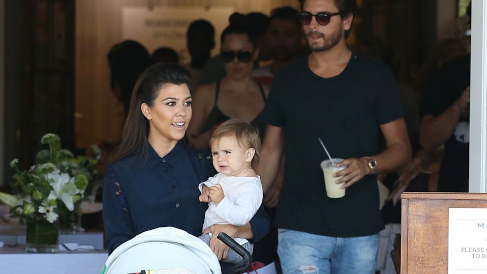 Kourtney Kardashian, Penelope Disick and Scott Disick are seen on Aug. 1, 2013 in Los Angeles.