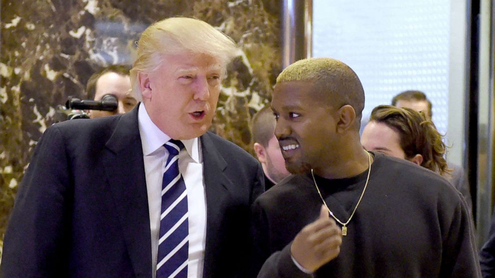 PHOTO: In this file photo taken on Dec. 13, 2016, President-elect Donald Trump and singer Kanye West arrive to speak with the press after their meetings at Trump Tower in New York. 