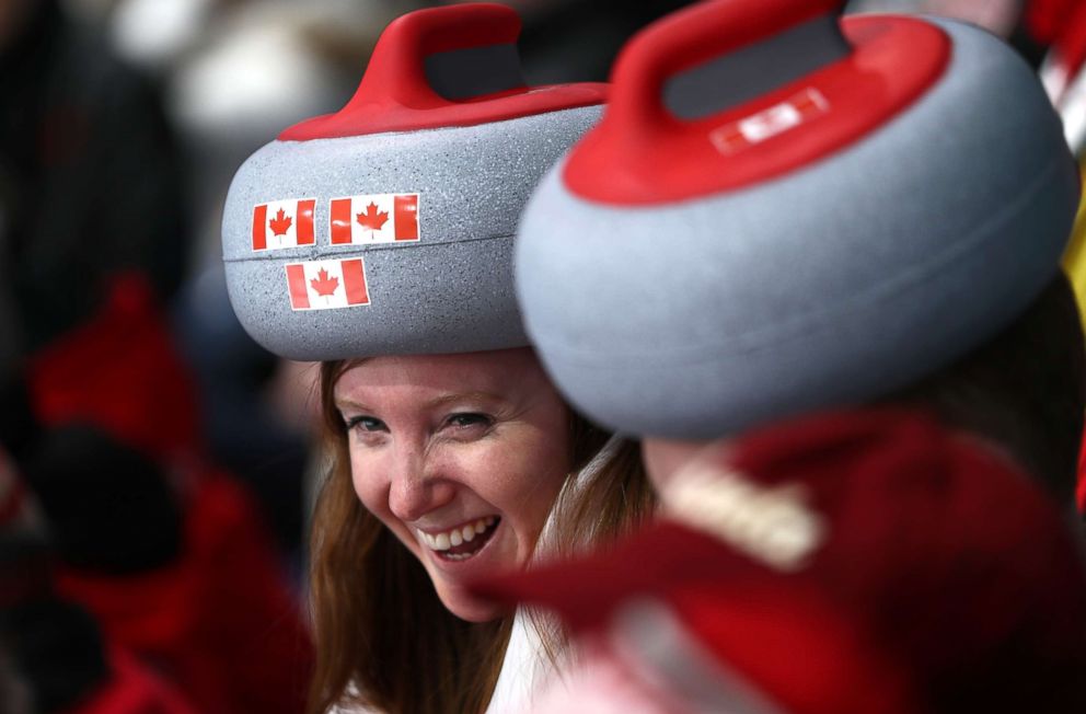 PHOTO: Canadian fans wore the proper hats as they watched curling mixed doubles gold medal game against Switzerland, Feb. 13, 2018.