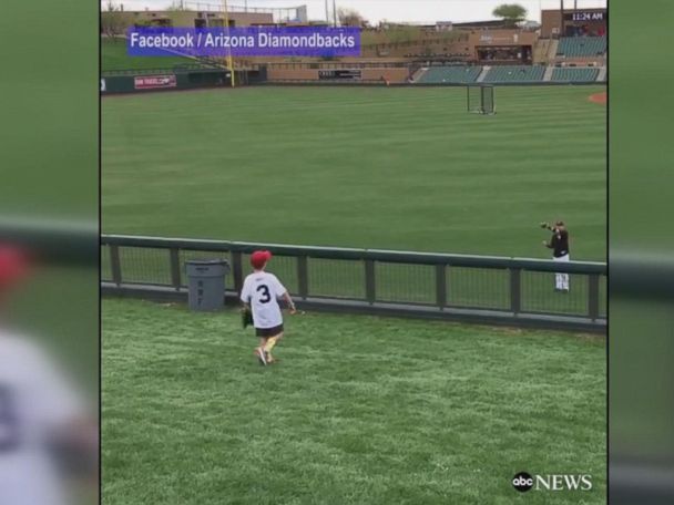 Play catch on the field before Diamondbacks game on Father's Day