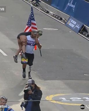 U.S. Army National Guard veteran, who lost his leg when his vehicle was hit by a roadside bomb in Afghanistan, carries his friend across the finish line of the Boston Marathon. "It was a spur of the moment kind of thing."