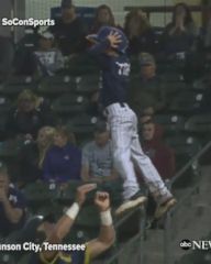 Baseball player shares epic handshake with bat boy