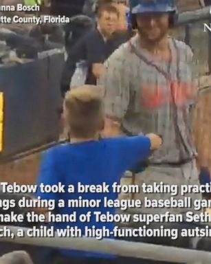 Tim Tebow took a break from taking practice swings to meet a young fan with autism. Right after, he hit a home run.