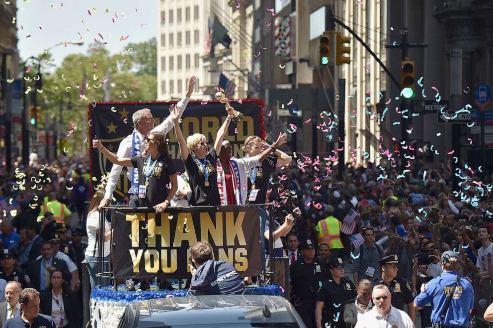 PHOTO: Members of U.S. Women's National Soccer team ride with New York City Mayor Bill de Blasio in the New York City Ticker Tape Parade celebrating their championship win, July 10, 2015 in New York City.