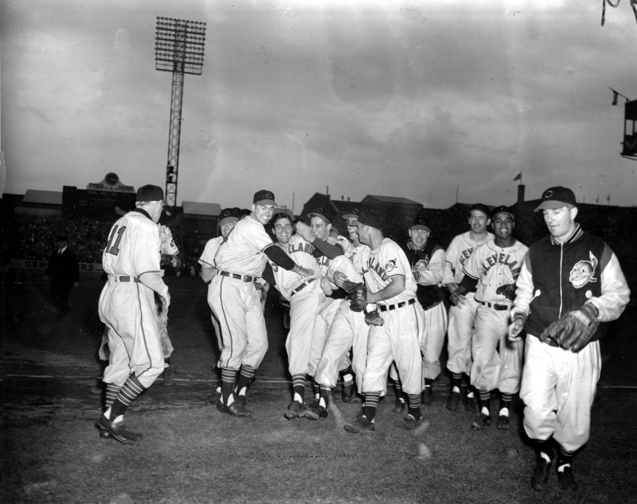 PHOTO: Bob Lemon, center, pitcher who won second World Series game for Cleveland Indians against the Boston Braves, is cheered by his teammates as they leave the field at Fenway Park in Boston, Oct. 7, 1948.