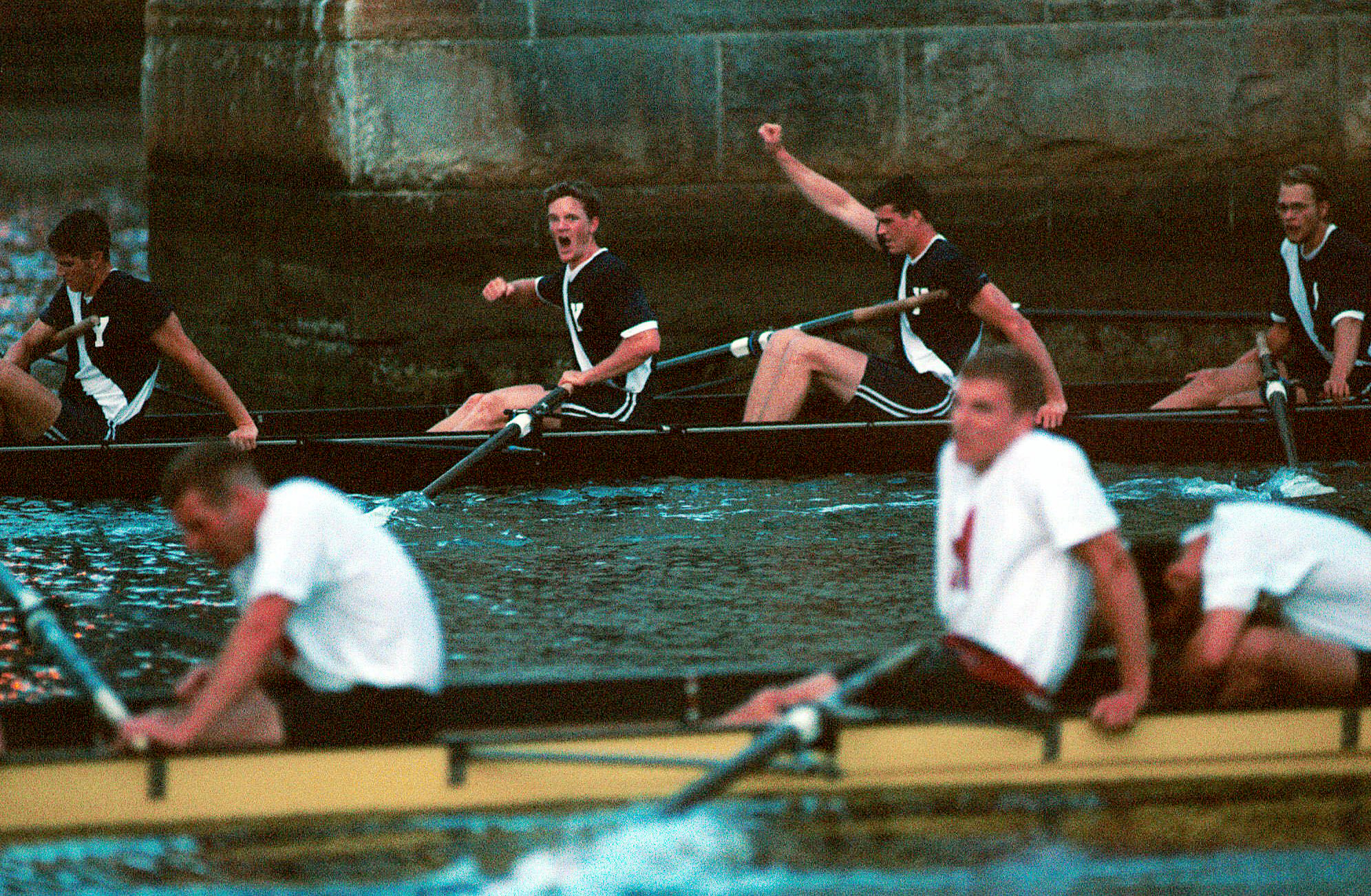 PHOTO: Yale's senior-dominated varsity rowing crew, rear, celebrates after rowing to a comeback victory, June 5, 1999, on the Thames River in New London, Conn., in the four-mile Yale-Harvard Regatta.