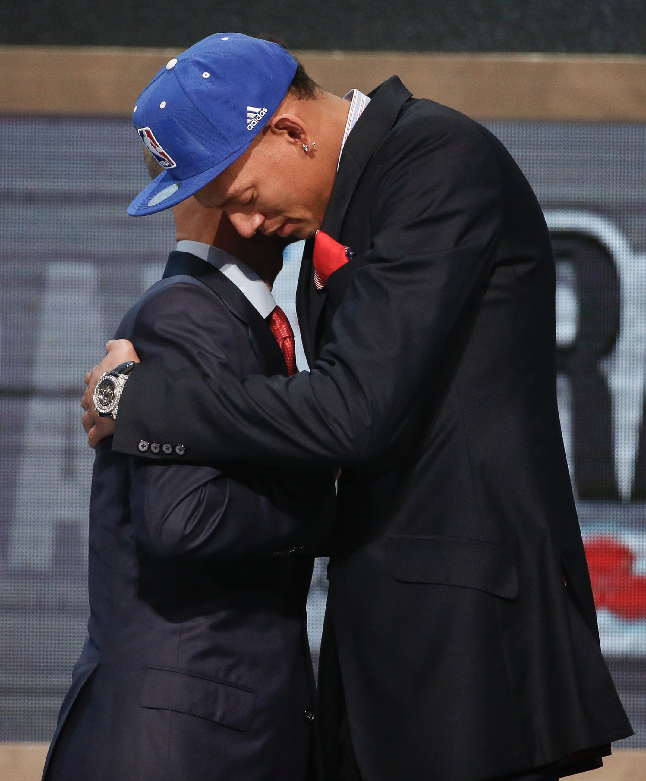PHOTO: Baylor center Isaiah Austin, right, hugs NBA Commissioner Adam Silver after being granted a ceremonial first round pick during the 2014 NBA draft, June 26, 2014, in New York.