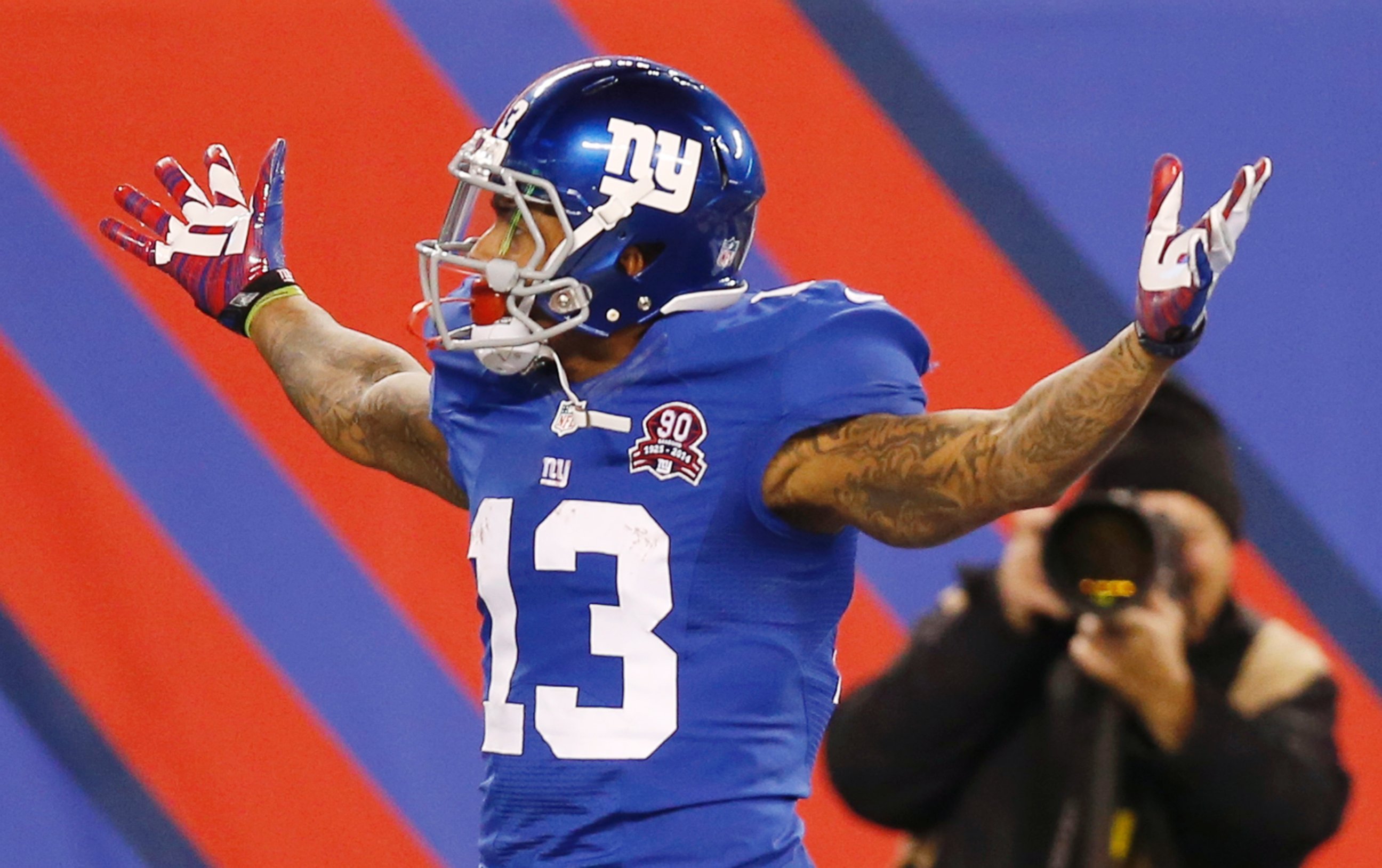 PHOTO: New York Giants wide receiver Odell Beckham Jr. reacts after making a one-handed catch for a touchdown against the Dallas Cowboys in the first quarter of an NFL football game, Nov. 23, 2014, in East Rutherford, N.J.