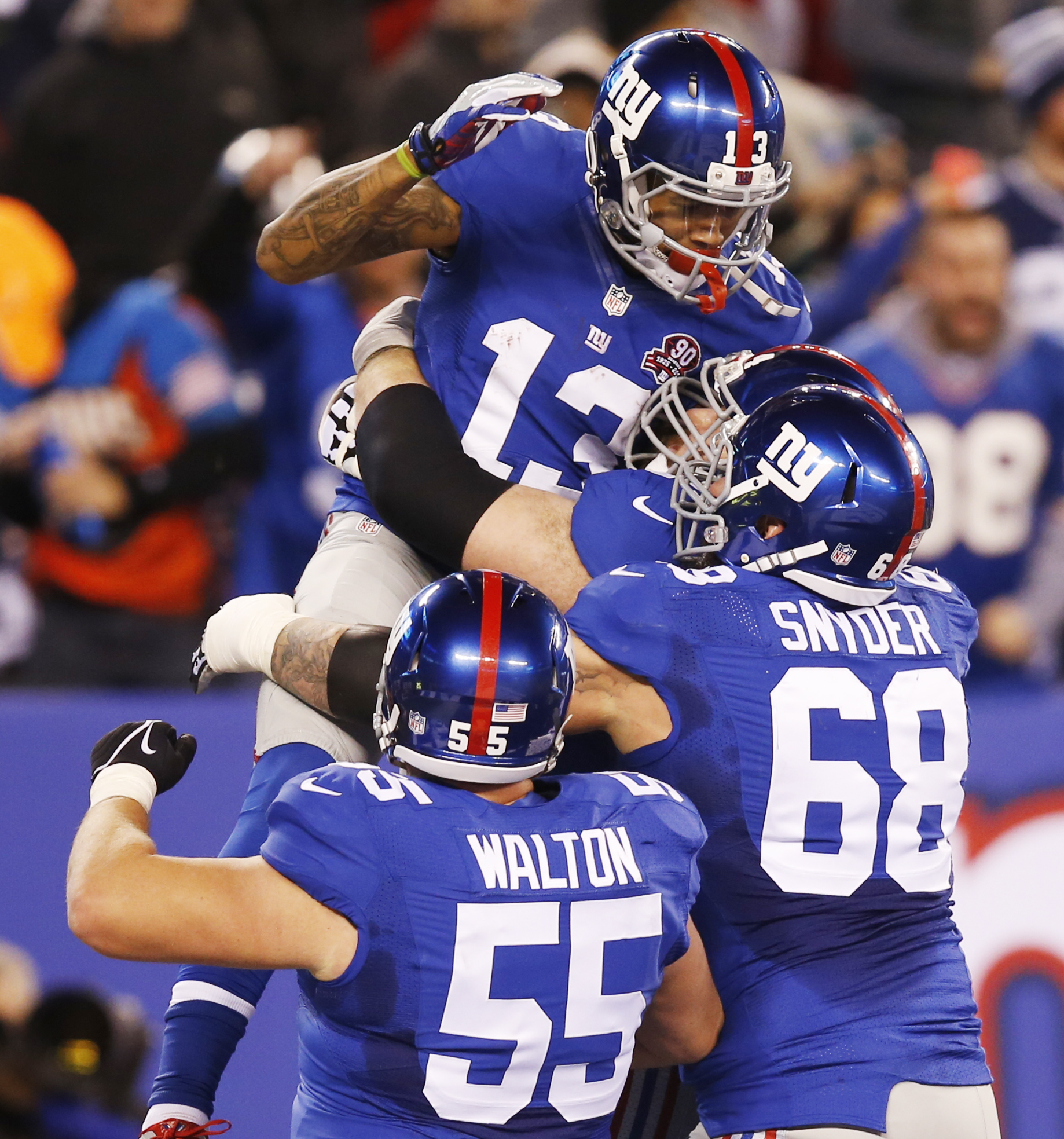PHOTO: New York Giants wide receiver Odell Beckham celebrates with teammates after making a touchdown catch against the Dallas Cowboys in the second quarter of an NFL football game, Nov. 23, 2014, in East Rutherford, N.J.
