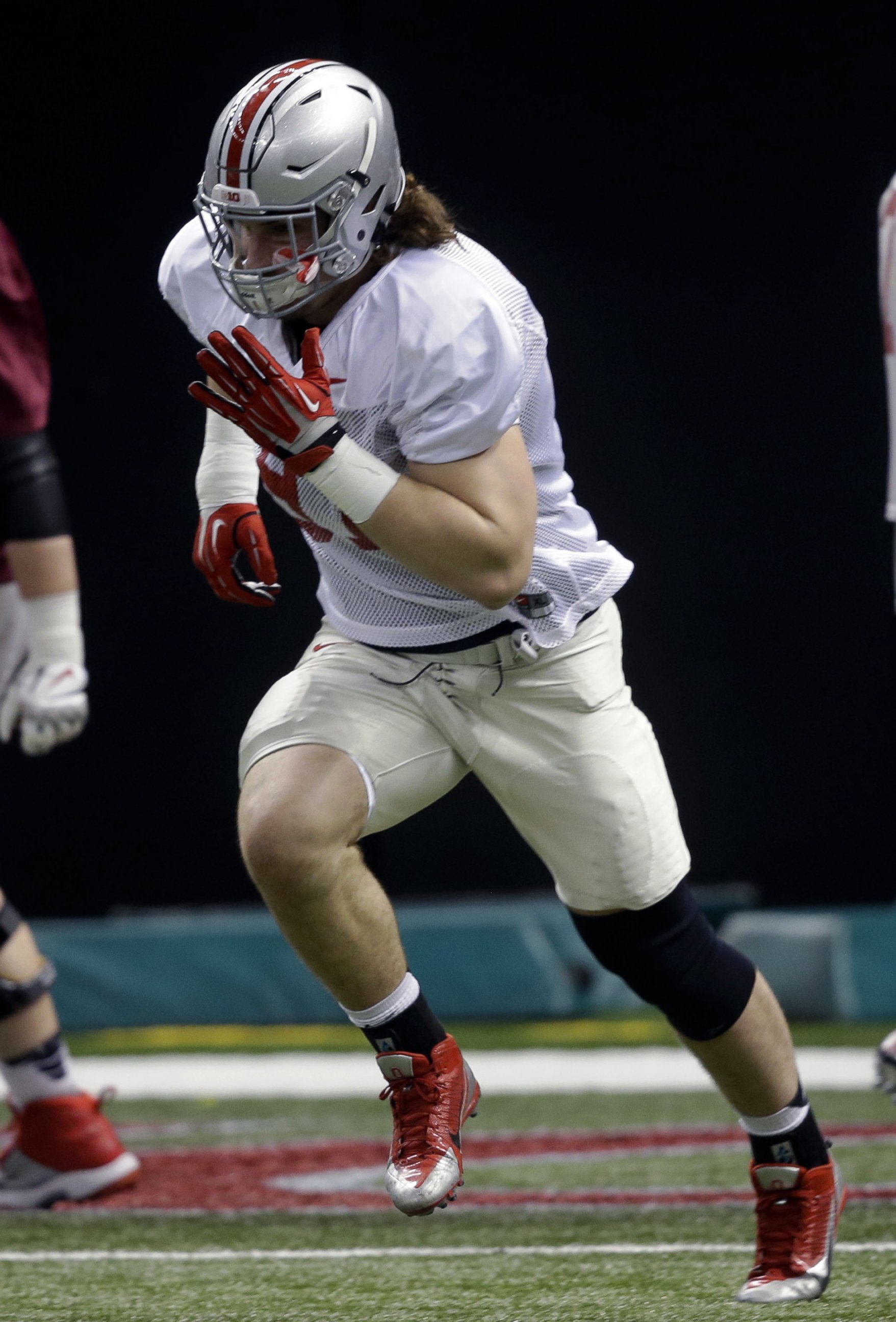 Ohio State defensive lineman Joey Bosa sprints during NCAA college football practice at the Mercedes-Benz Superdome in New Orleans, La., Sunday, Dec. 28, 2014. Ohio State is scheduled to play Alabama in the Sugar Bowl on Jan. 1, 2015.