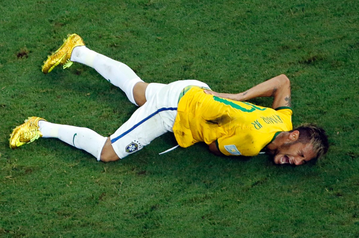 PHOTO: Brazil's Neymar grimaces in pain during the World Cup quarterfinal soccer match between Brazil and Colombia at the Arena Castelao in Fortaleza, Brazil, Friday, July 4, 2014. Brazil's team doctor says Neymar will miss the rest of the World Cup.