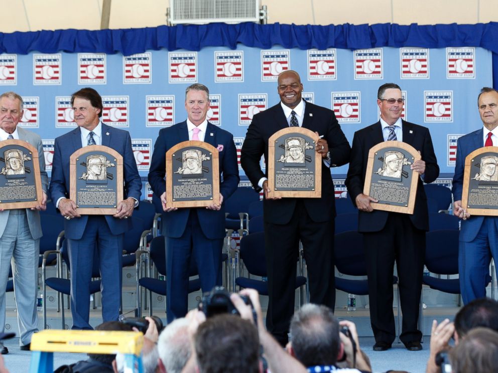 PHOTO: National Baseball Hall of Fame inductees, from left, Bobby Cox, Tony La Russa, Tom Glavine, Frank Thomas, Greg Maddux and Joe Torre hold their plaques after their induction ceremony, July 27, 2014, in Cooperstown, N.Y.