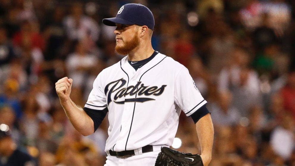 FILE - In this Oct. 1, 2015, file photo, San Diego Padres closer Craig Kimbrel pumps his fist after striking out the final batter against the Milwaukee Brewers in the ninth inning of a baseball game  in San Diego.  New Boston Red Sox boss Dave Dombrowski on Friday night, Nov. 13, 2015, made his first big move to rebuild the franchise after its third last-place finish in four years, acquiring the four-time All-Star closer from the Padres for four prospects.  
