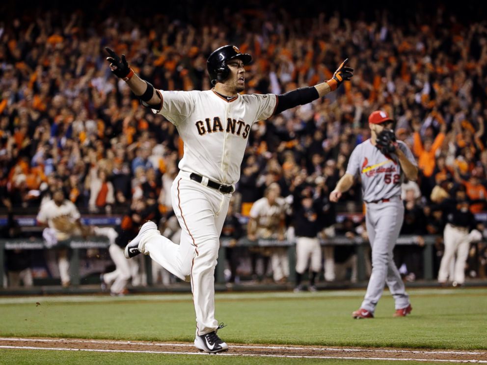 San Francisco Giants' Travis Ishikawa reacts after hitting a walk-off three-run home run during the ninth inning of Game 5 of the National League baseball championship series against the St. Louis Cardinals Thursday, Oct. 16, 2014, in San Francisco.
