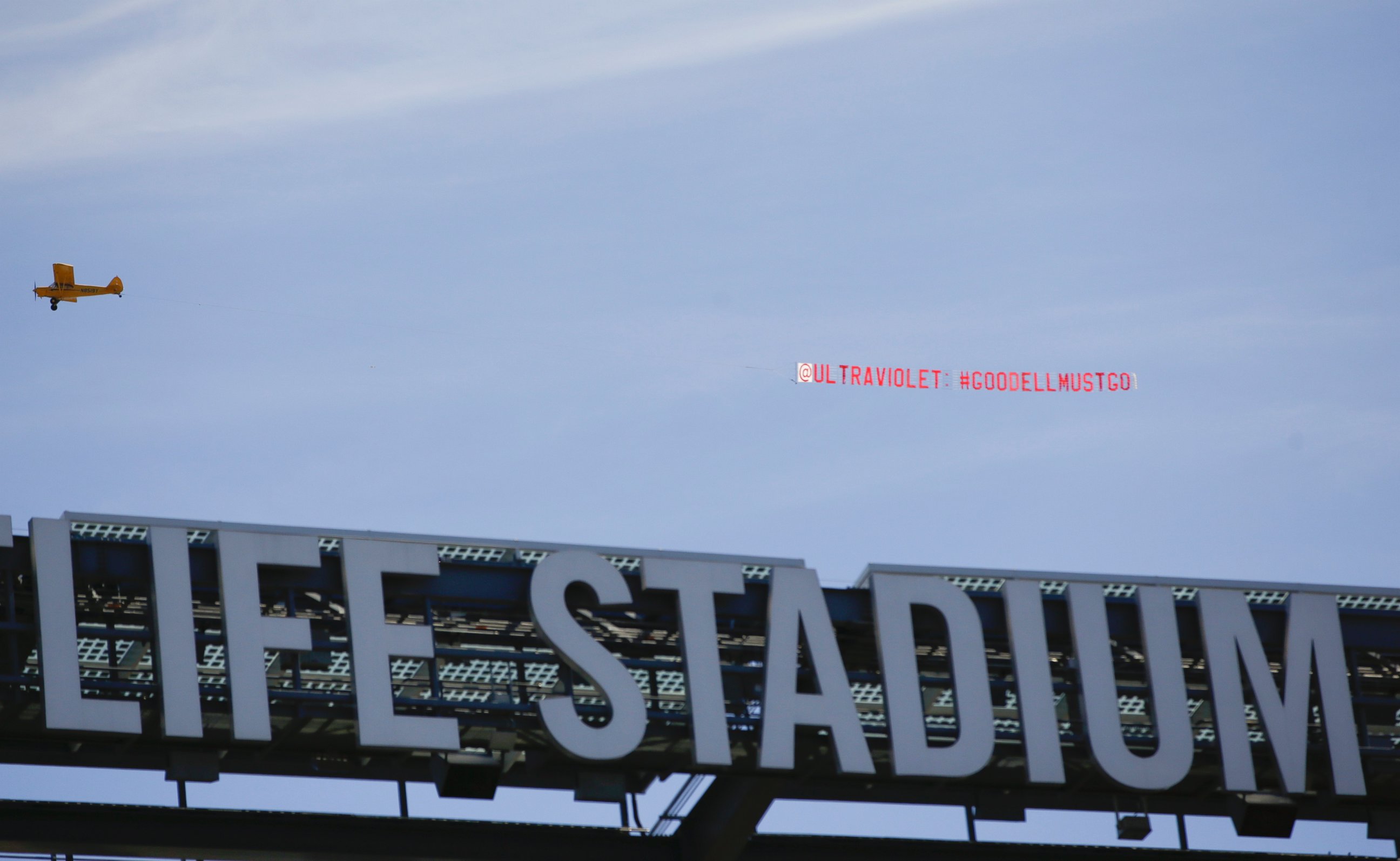 PHOTO: A plane pulls a banner over MetLife Stadium while teams warm up before an NFL football game between the New York Giants and the Arizona Cardinals, Sept. 14, 2014, in East Rutherford, N.J.