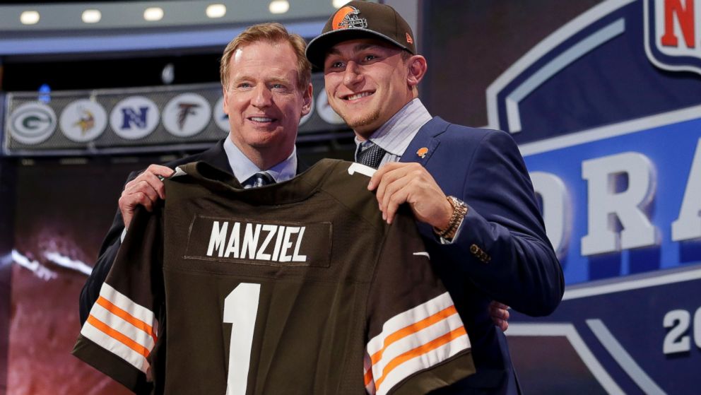 PHOTO: Texas A&M quarterback Johnny Manziel poses with NFL commissioner Roger Goodell after being selected by the Cleveland Browns as the 22nd pick in the first round of the 2014 NFL Draft, Thursday, May 8, 2014, in New York. 