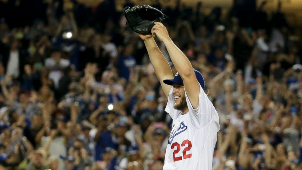 Los Angeles Dodgers starting pitcher Clayton Kershaw celebrates his no-hitter against the Colorado Rockies, June 18, 2014.