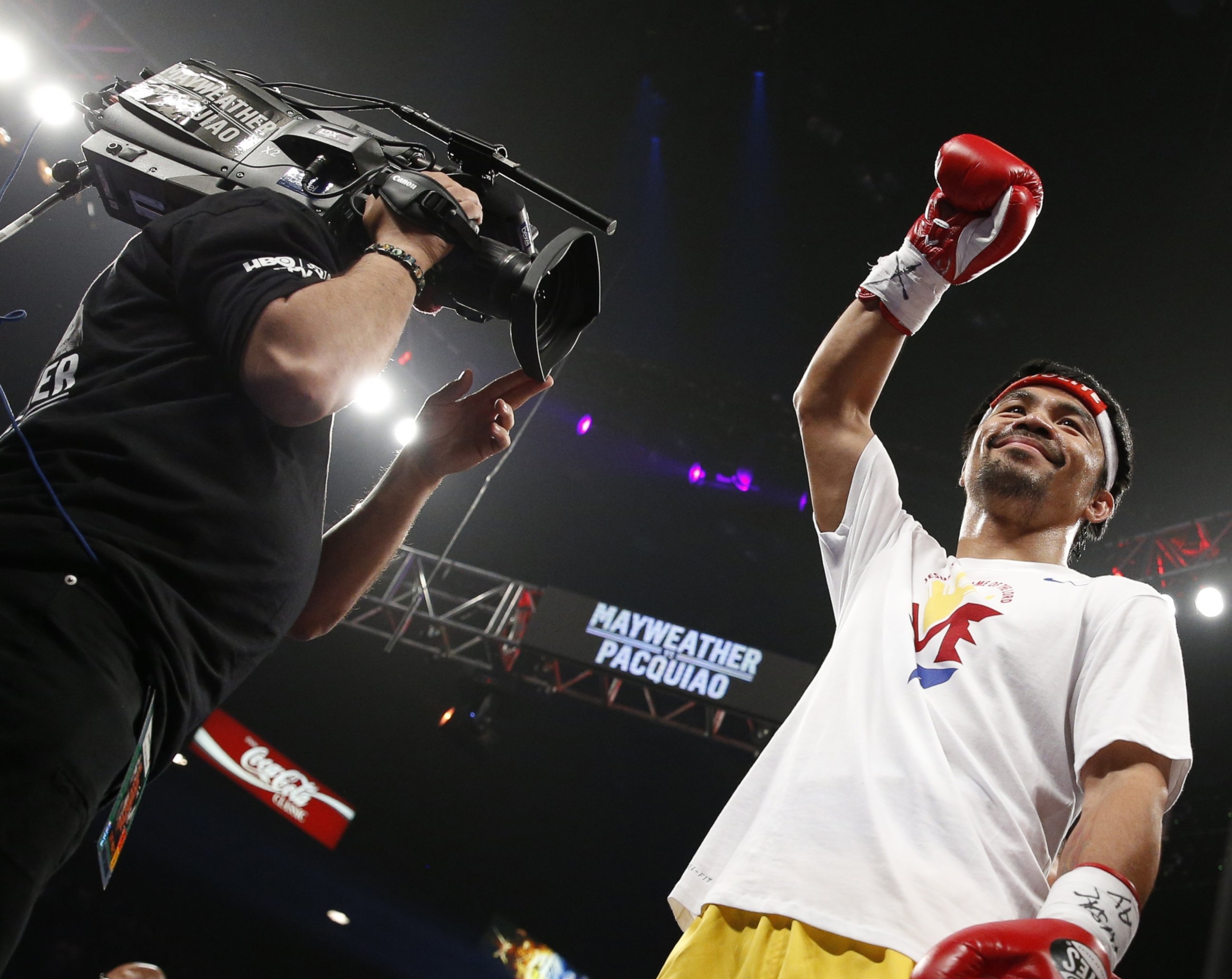 PHOTO: Manny Pacquiao, from the Philippines, acknowledges the crowd before the start of his world welterweight championship bout against Floyd Mayweather Jr., on Saturday, May 2, 2015 in Las Vegas.  