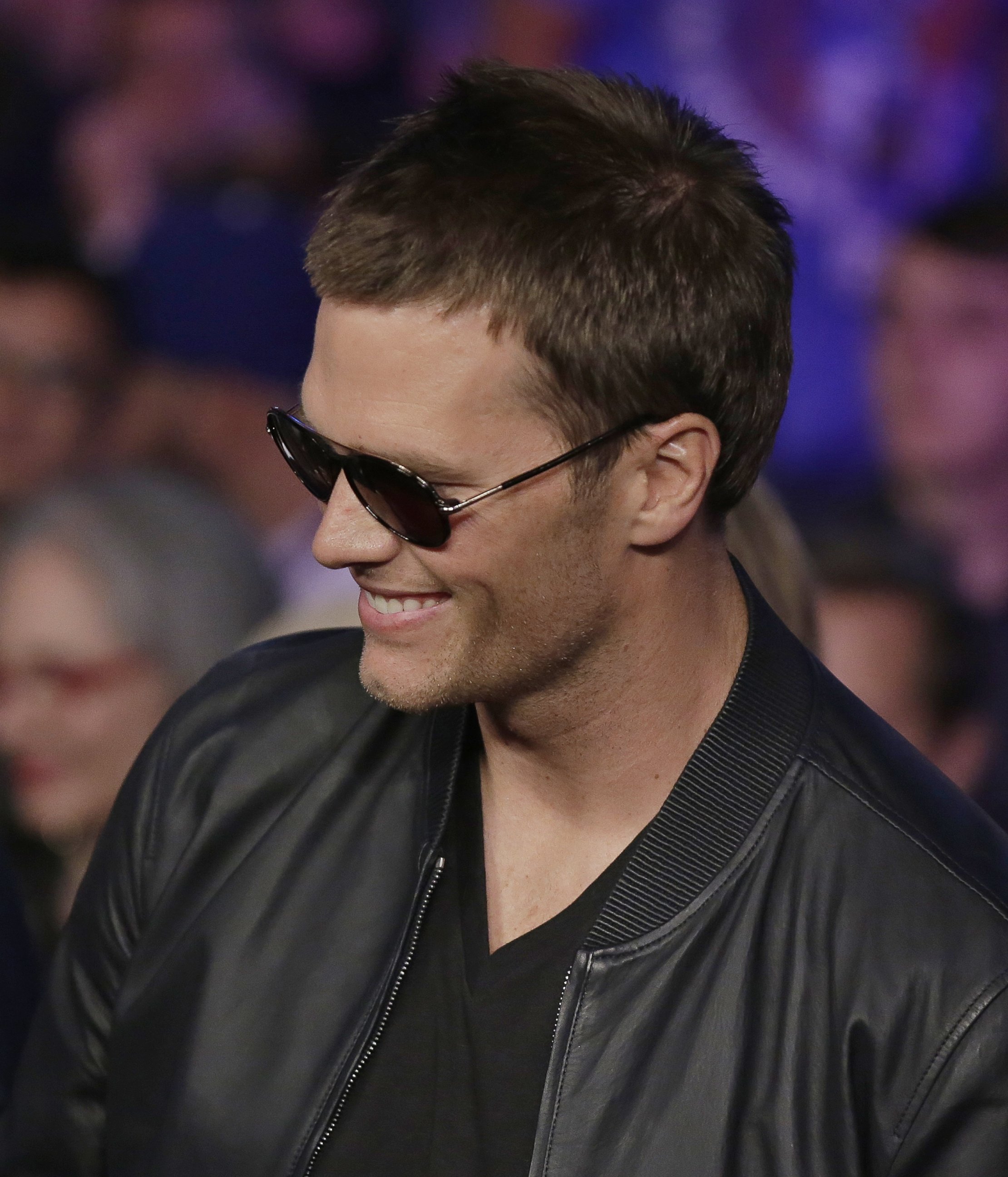 PHOTO: New England Patriots quarterback Tom Brady enters the arena before the start of the world welterweight championship bout between Floyd Mayweather Jr., and Manny Pacquiao, on Saturday, May 2, 2015 in Las Vegas.