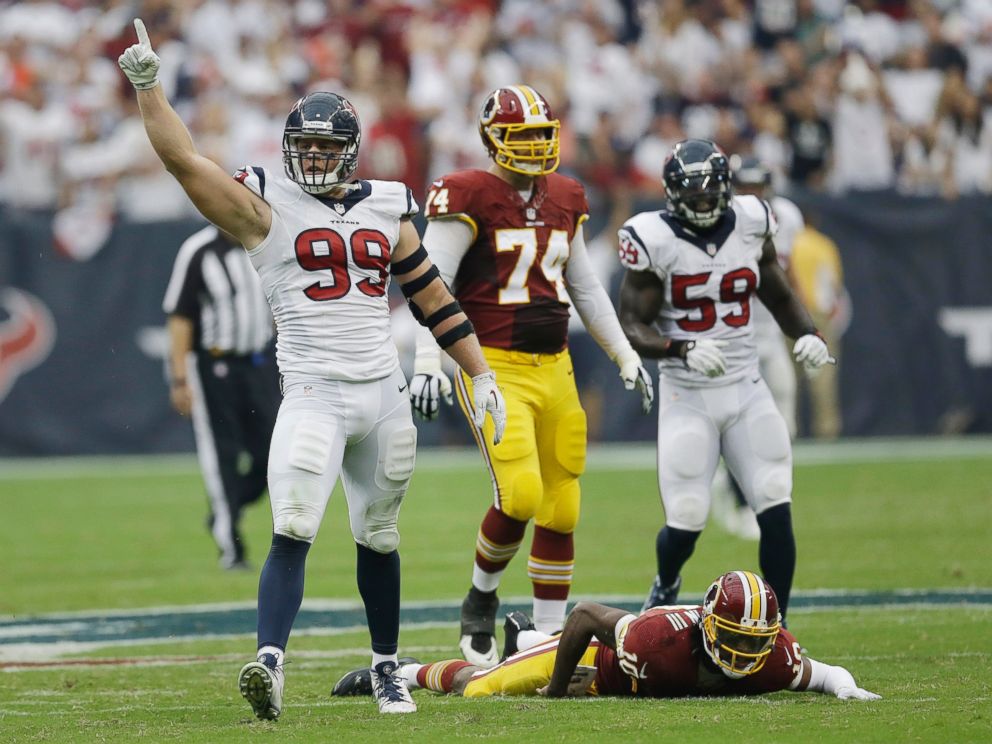 PHOTO: Houston Texans' J.J. Watt celebrates after sacking Washington Redskins' quarterback Robert Griffin III, Sept. 7, 2014, in Houston.