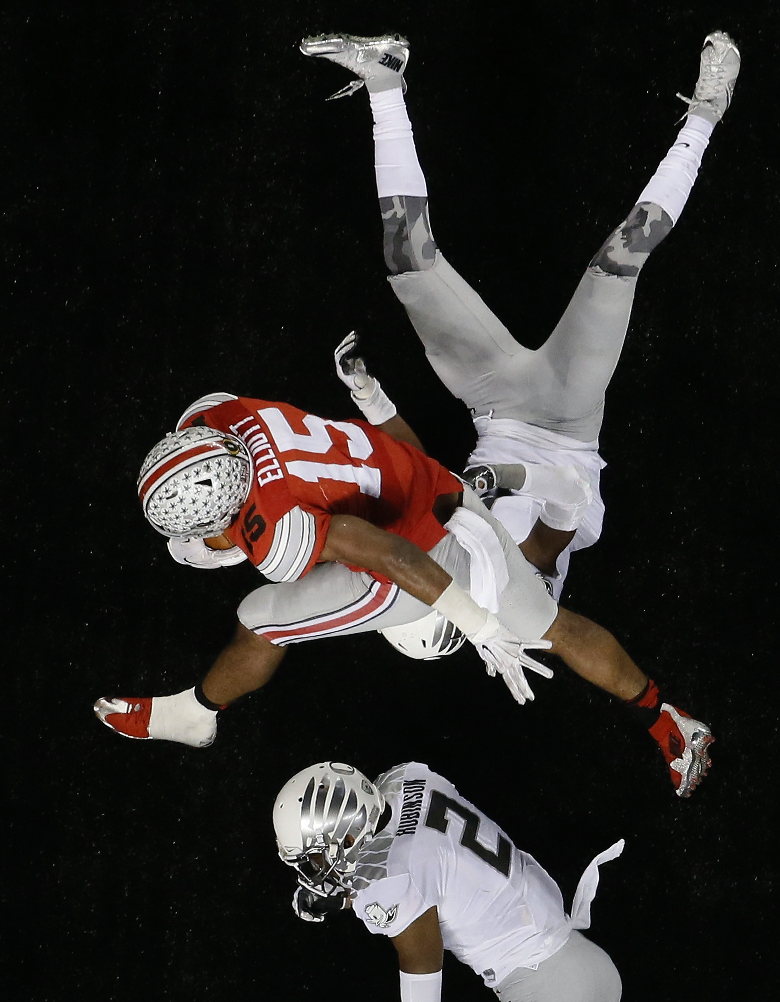 PHOTO: Ohio State's Ezekiel Elliott (15) breaks away for a nine-yard touchdown run during the NCAA college football playoff championship game against Oregon, Jan. 12, 2015, in Arlington, Texas.